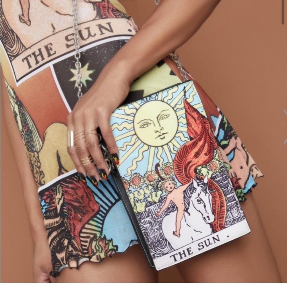 Wild Card Crossbody Bag
$50 $60 Size: 10" H x 6" W × 2.5'
Dolls Kill